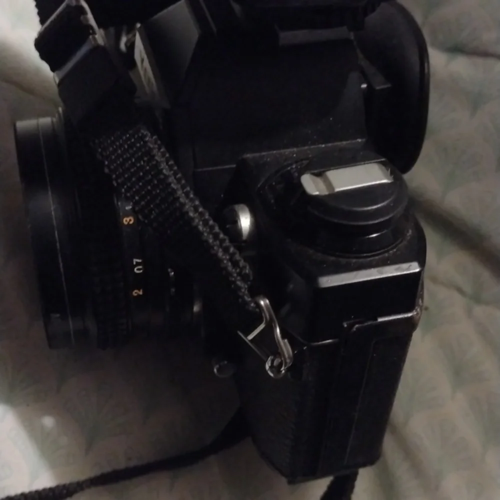 Konica Black Camera with Sunpak Flash
